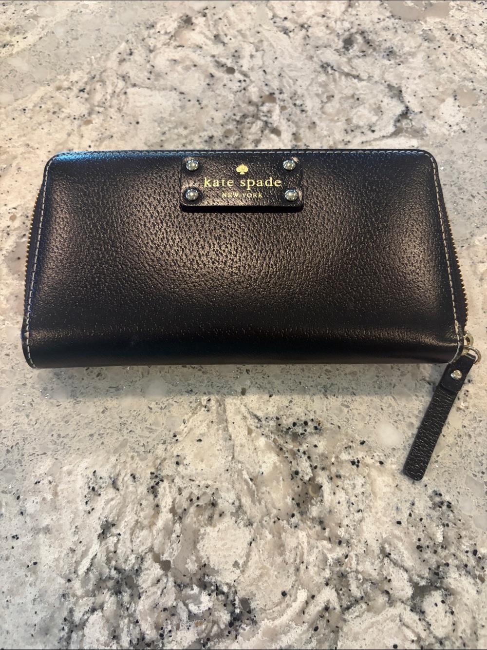 Kate Spade black pebbled leather zip wallet with gold logo